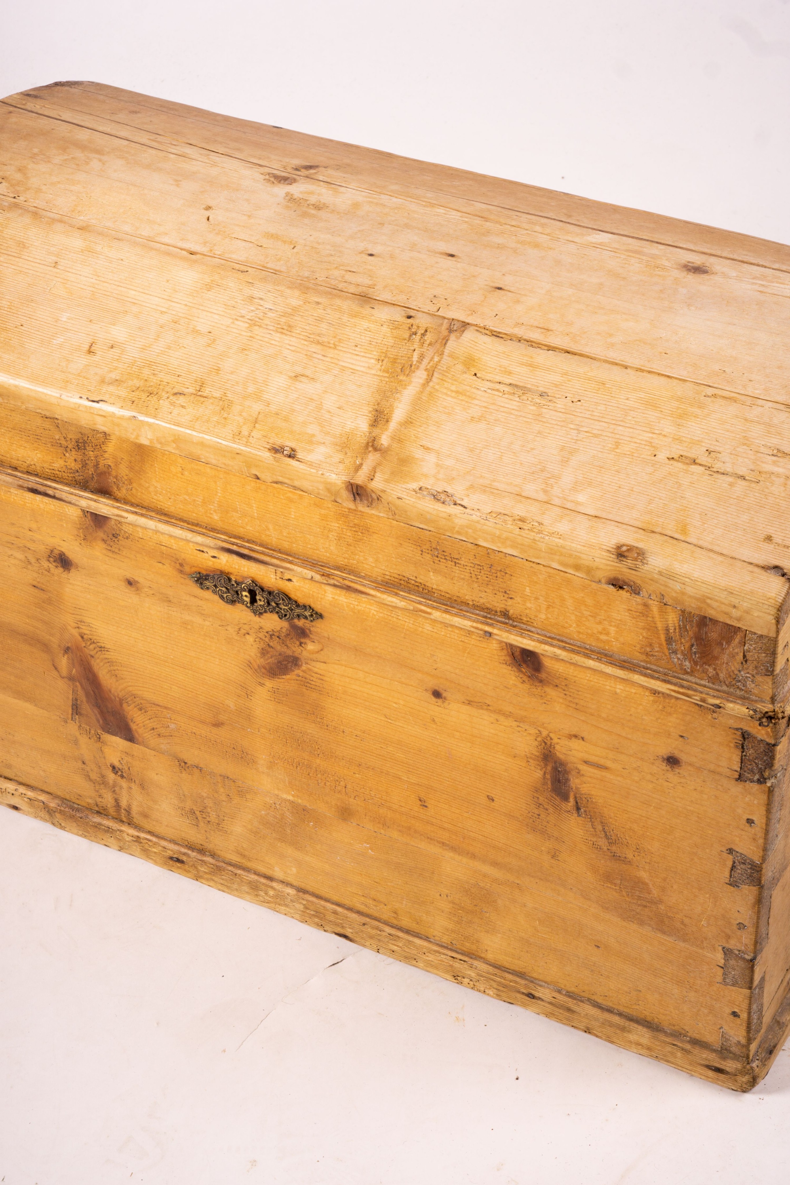 A small 19th century Continental pine domed top trunk, length 74cm, width 40cm, height 46cm